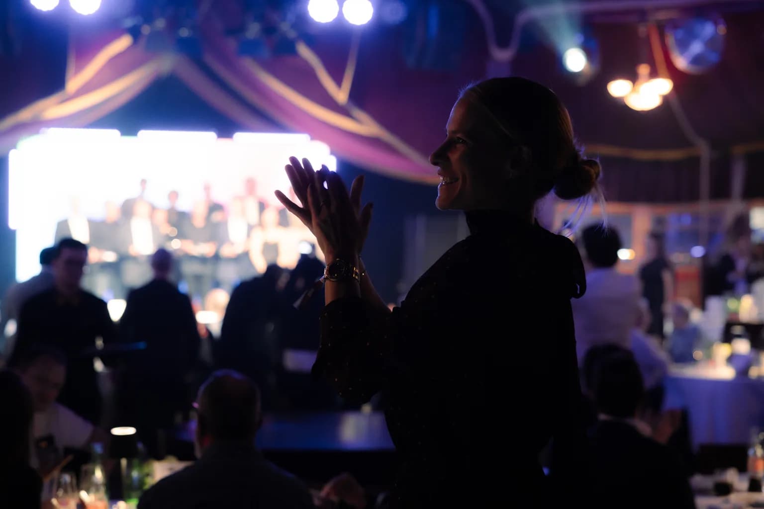 Guest applauding in front of the stage at the Geely Brand Launch Night